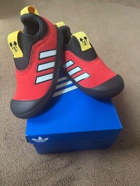 adidas Kids Red and Black Slip-On Sneakers with Yellow Mickey Tabs